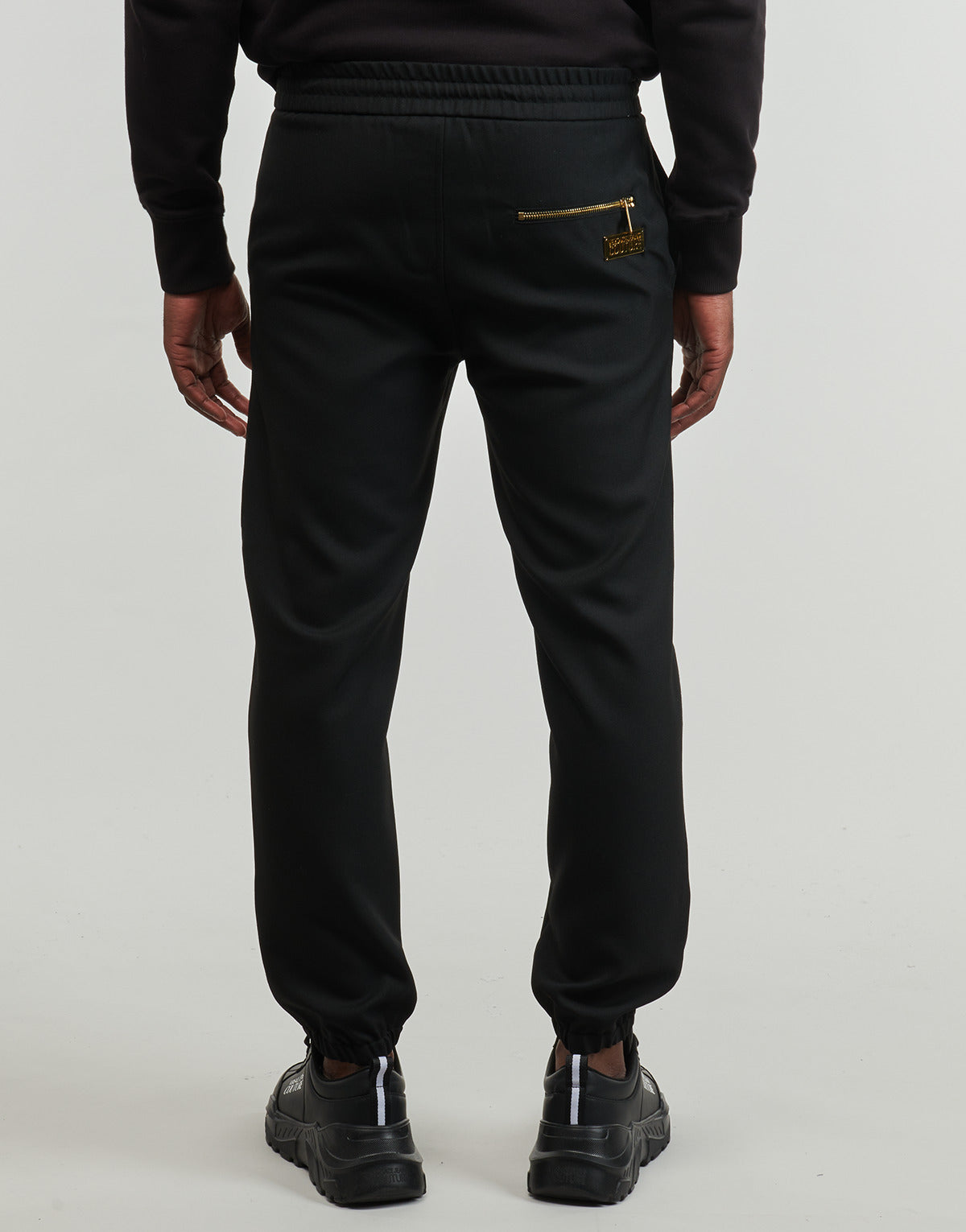 Pantaloni morbidi / Pantaloni alla zuava Uomo Versace Jeans Couture PANT.77GAA100 Nero