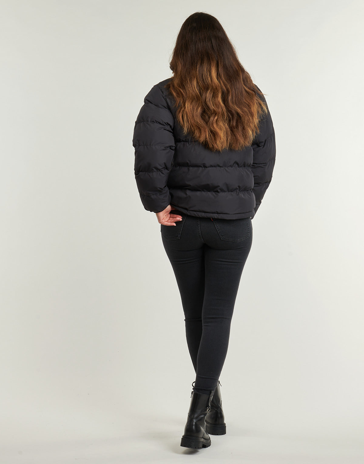 Piumino Donna Helly Hansen W YU 23 REVERSIBLE PUFFER Nero