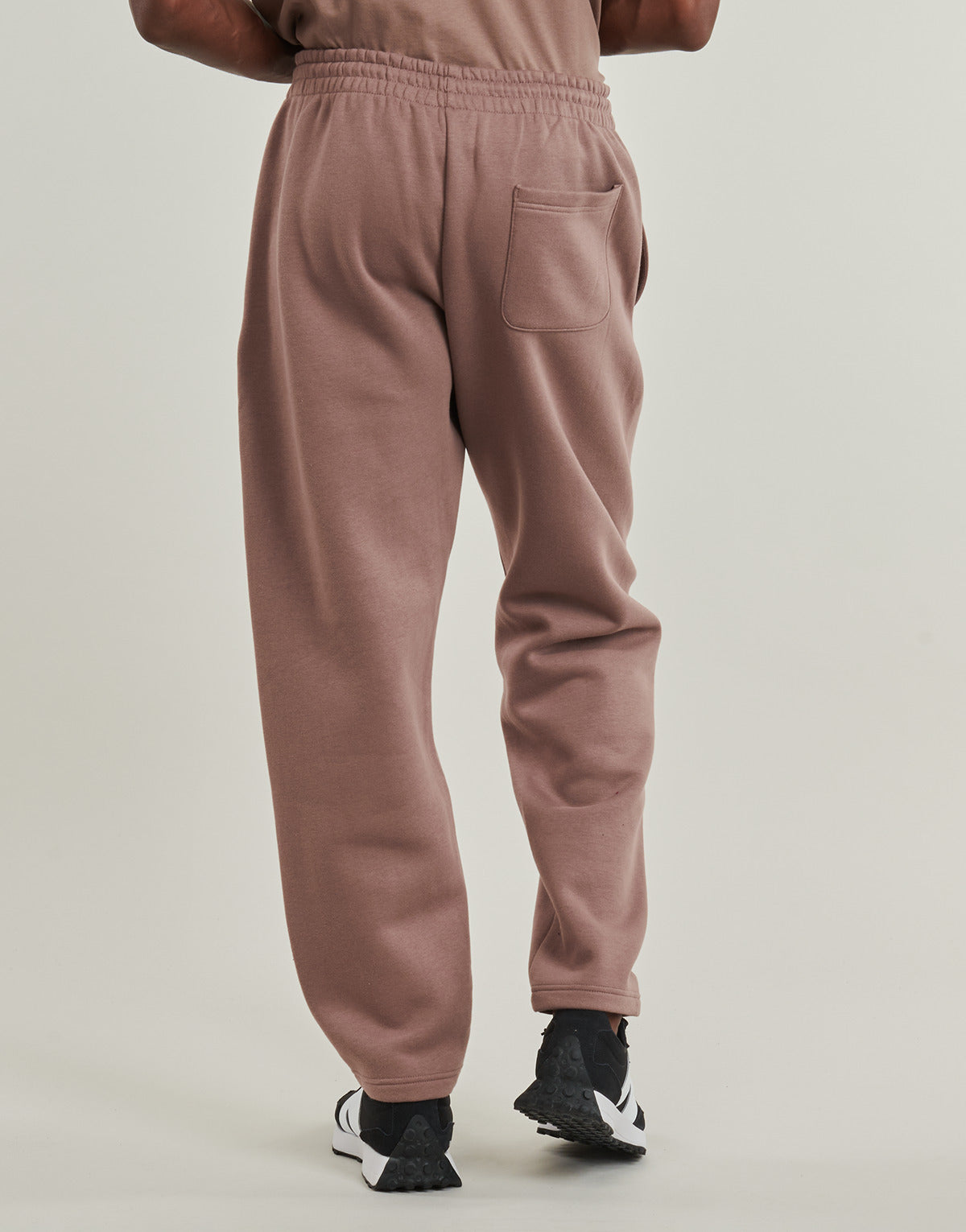 Pantaloni Sportivi Uomo New Balance LINEAR GRAPHIC FLEECE PANT Marrone