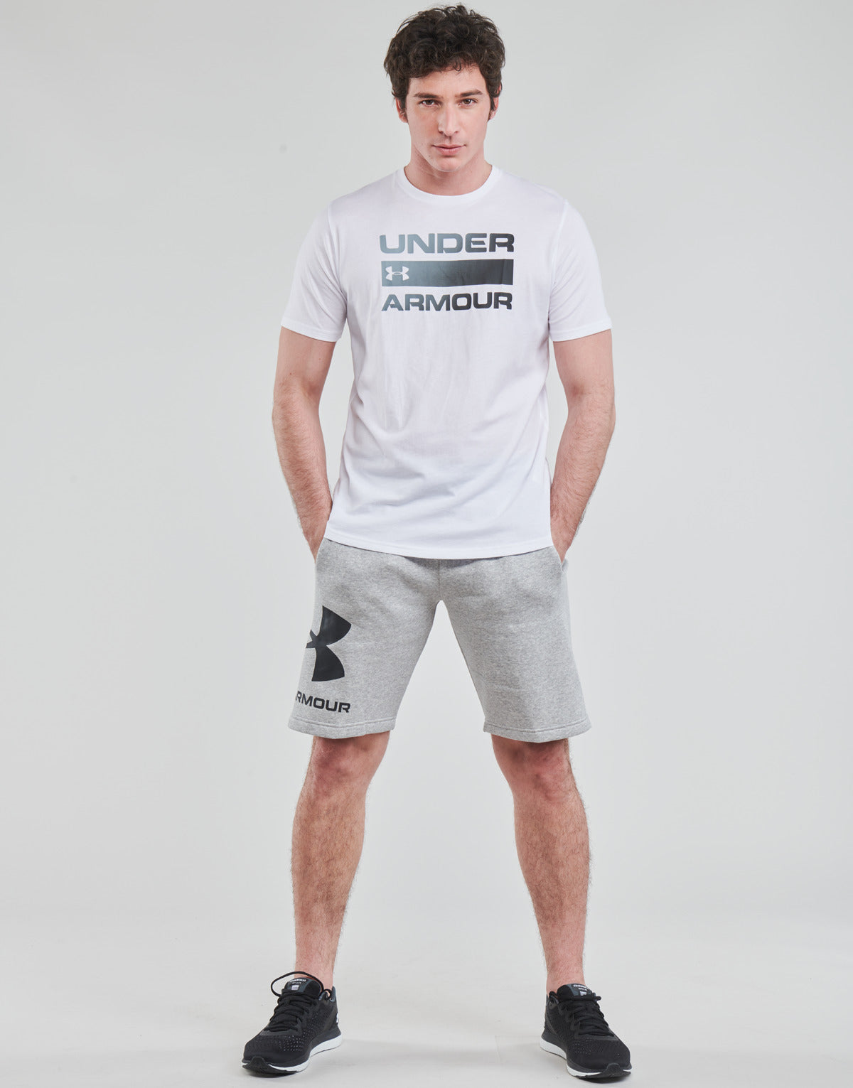 Pantaloni corti Uomo Under Armour UA RIVAL FLC BIG LOGO SHORTS Grigio