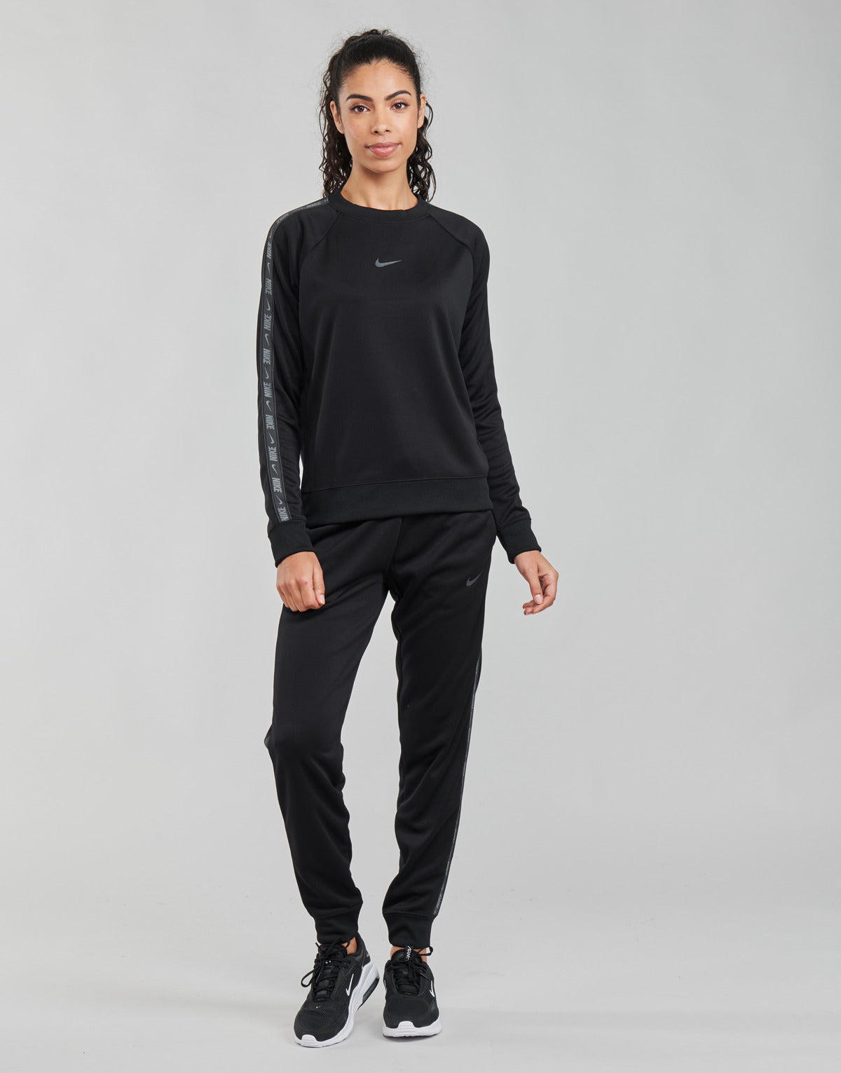 Pantaloni Sportivi Donna Nike  W NSW PK TAPE REG PANT  Nero