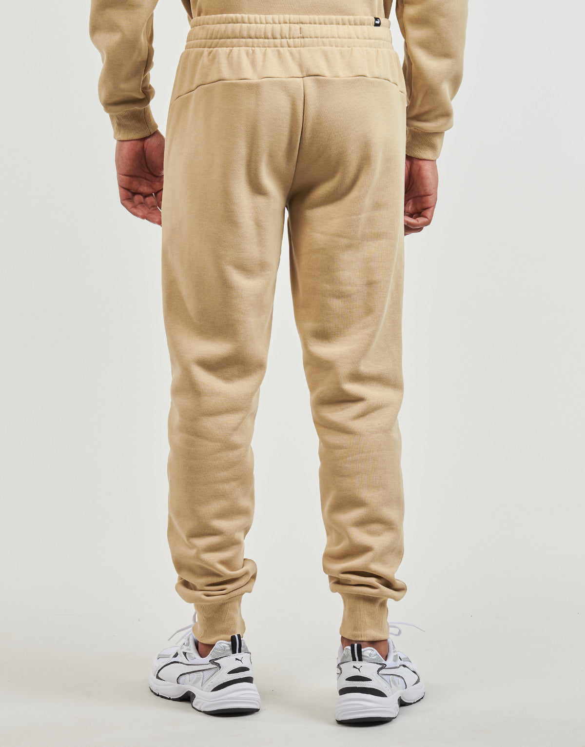 Pantaloni Sportivi Uomo Puma  ESS LOGO PANTS FL CL (S)  Beige