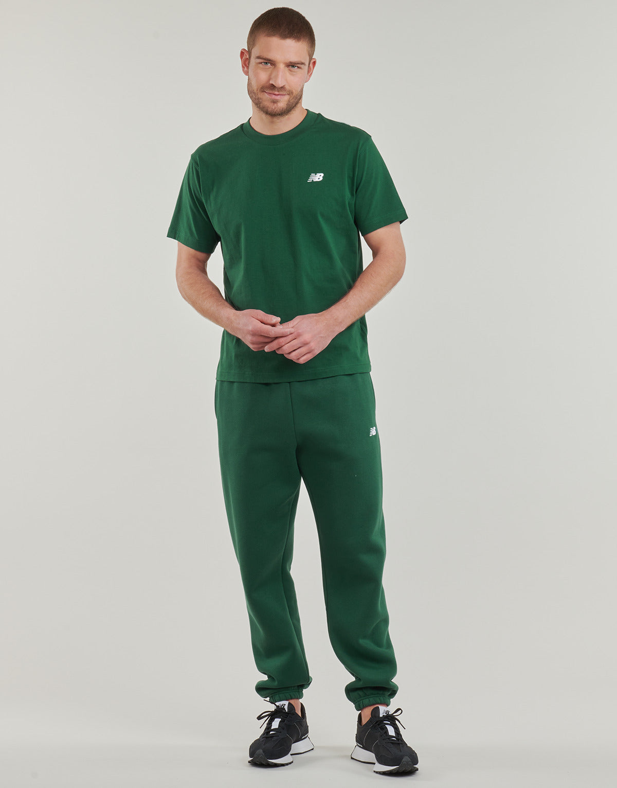 Pantaloni Sportivi Uomo New Balance  FLEECE JOGGER  Verde