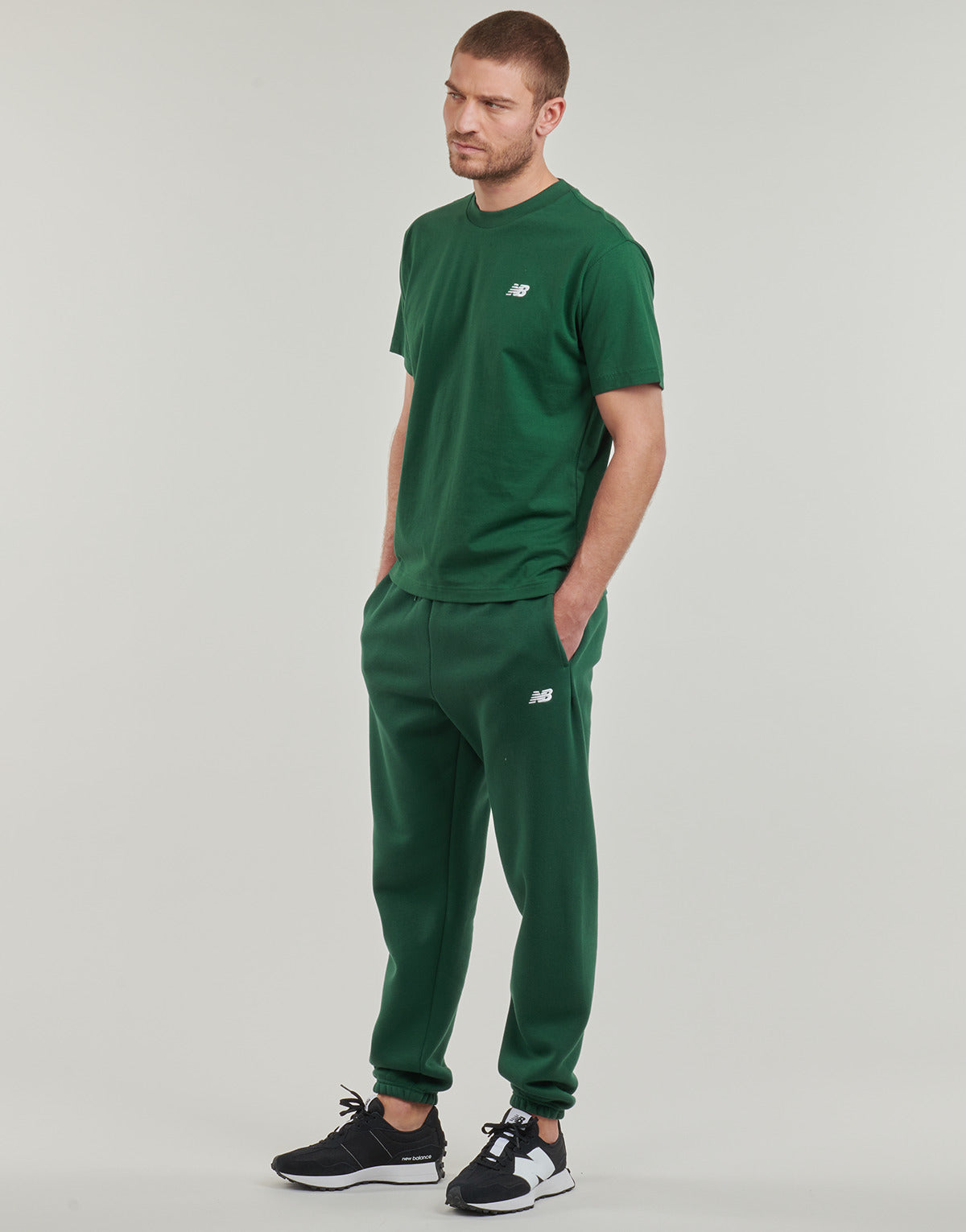 Pantaloni Sportivi Uomo New Balance  FLEECE JOGGER  Verde