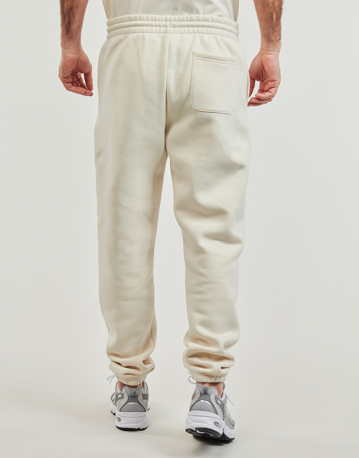 Pantaloni Sportivi Uomo New Balance  FLEECE JOGGER  Beige