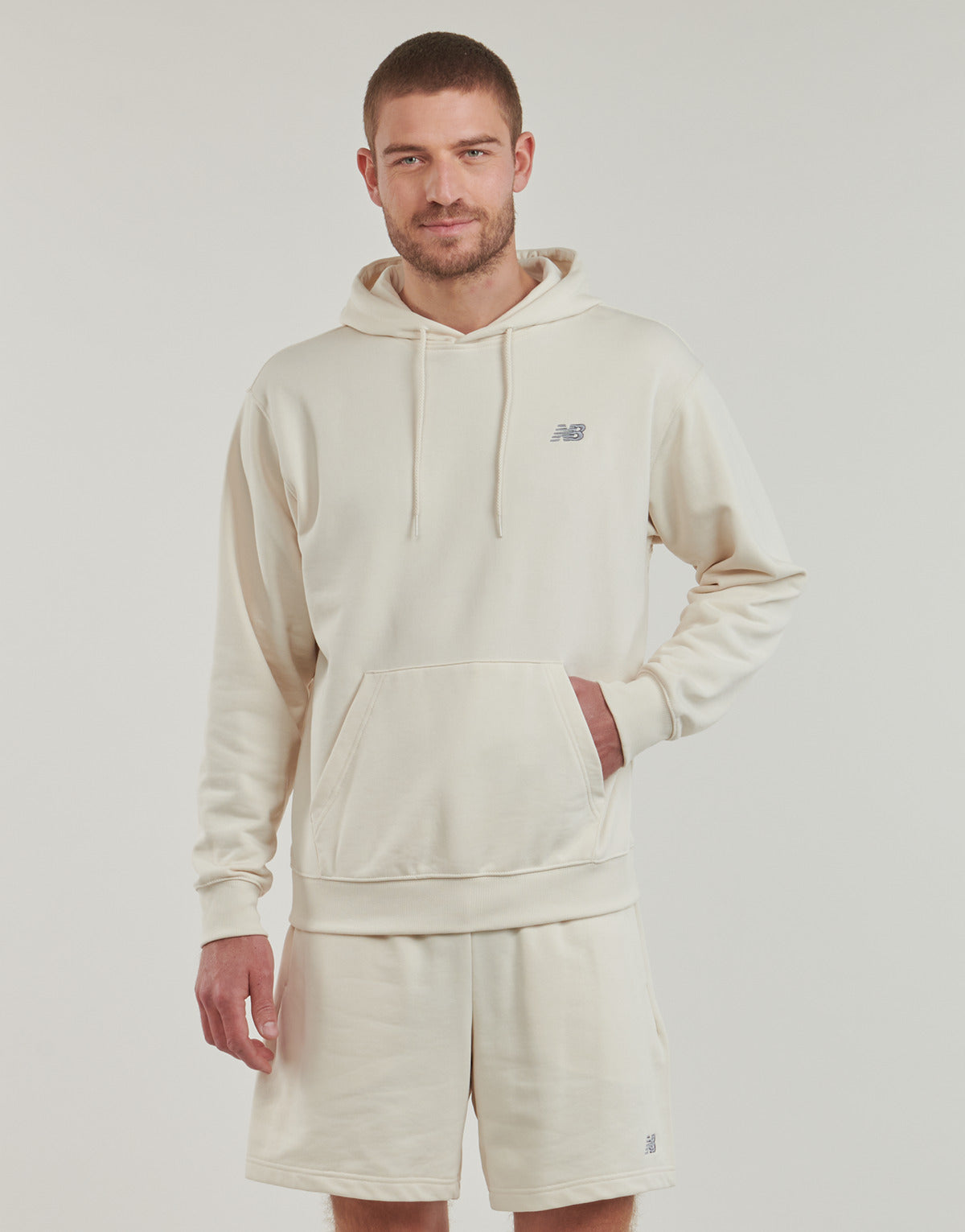 Felpa Uomo New Balance  BRUSHED SMALL LOGO HOODIE  Beige