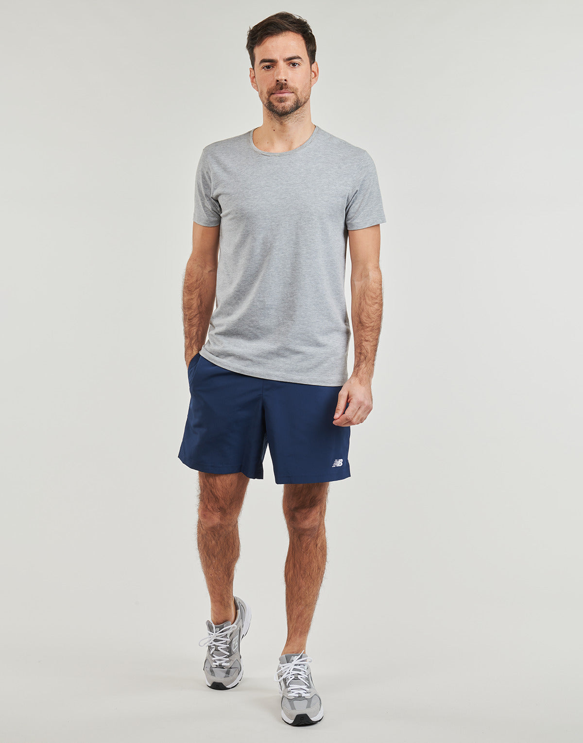 Pantaloni corti Uomo New Balance  NB WOVEN SHORT  Blu