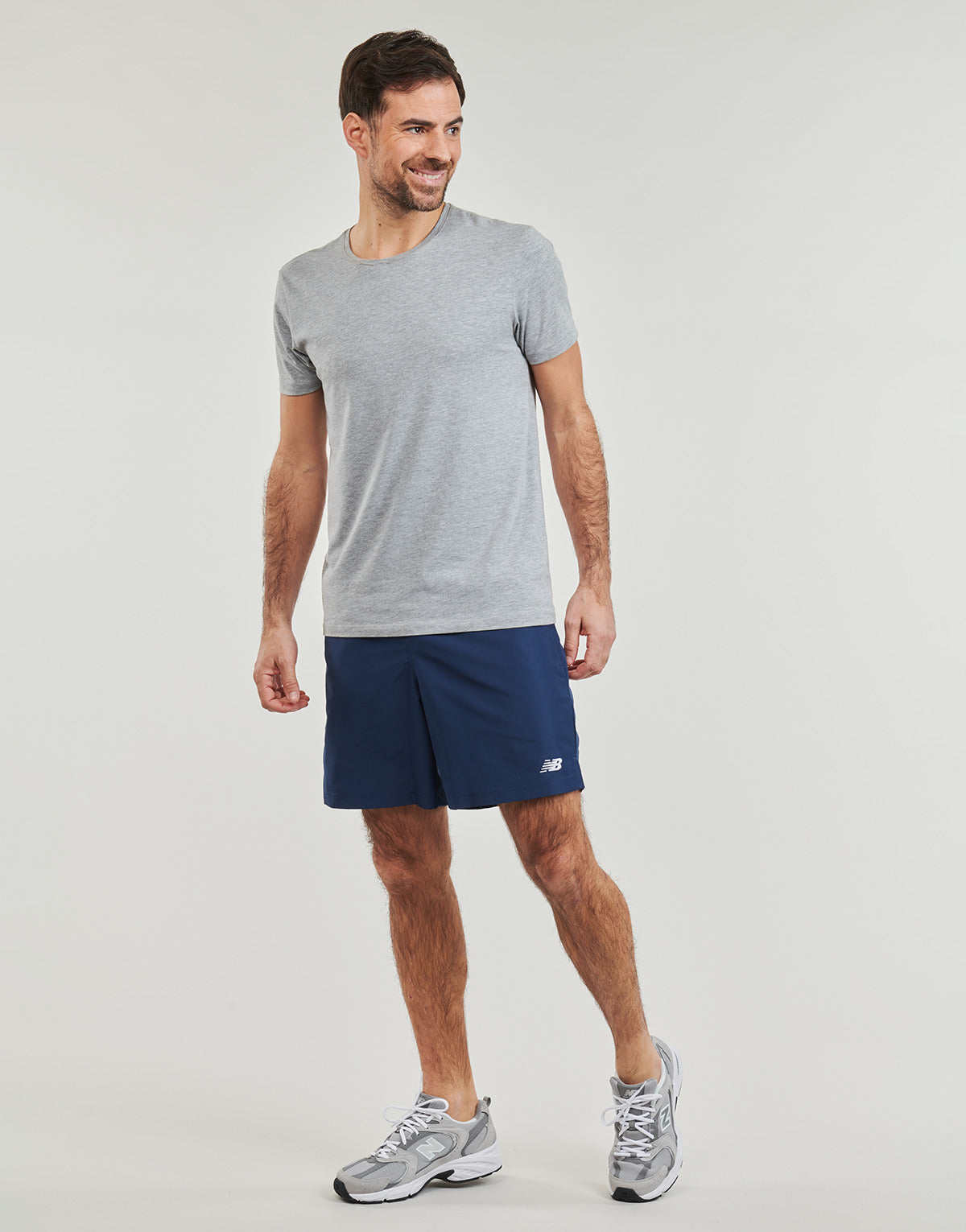 Pantaloni corti Uomo New Balance  NB WOVEN SHORT  Blu