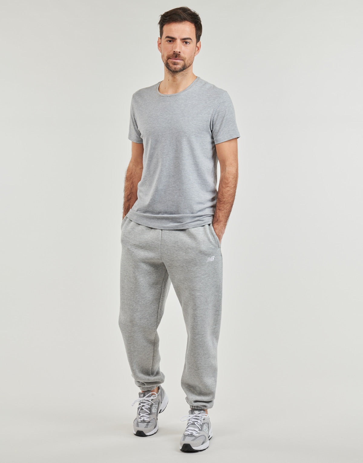 Pantaloni Sportivi Uomo New Balance  FRENCH TERRY JOGGER  Grigio