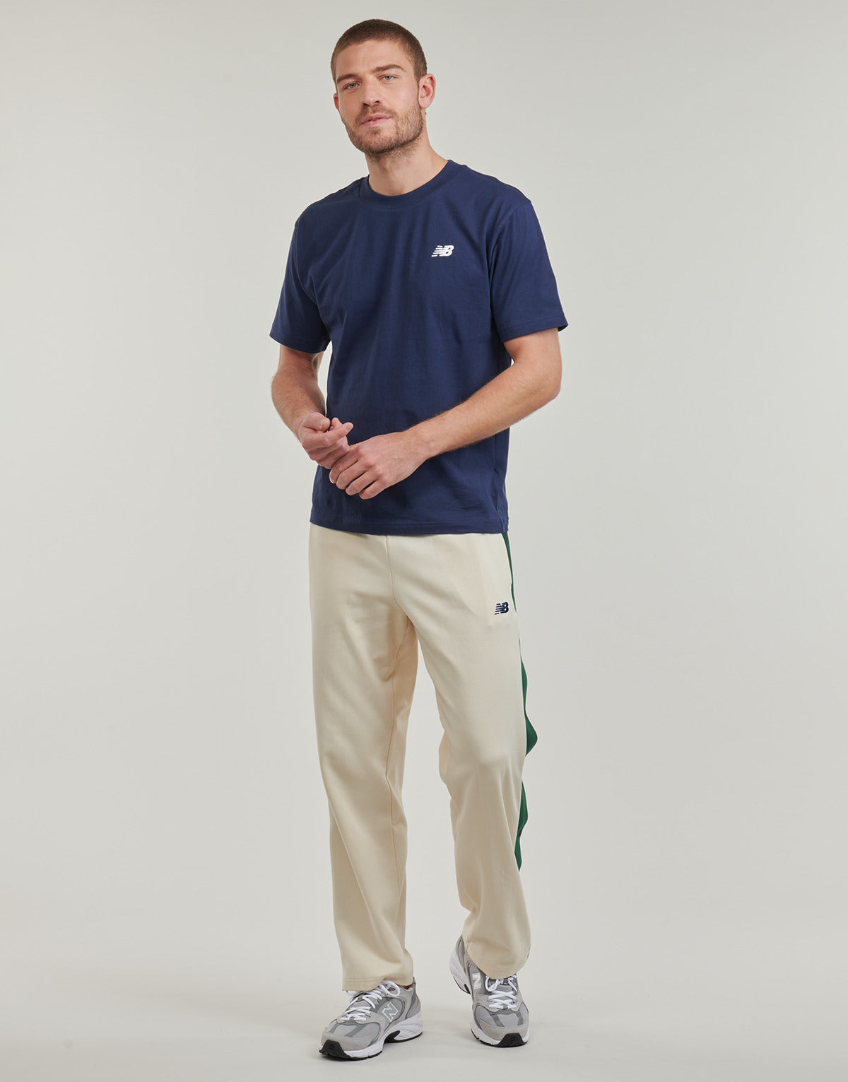 Pantaloni Sportivi Uomo New Balance  SGH BASKETBALL TRACK PANT  Beige