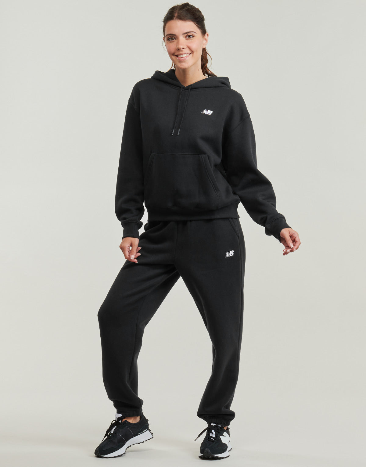 Pantaloni Sportivi Donna New Balance  SPORT ESSENTIAL FLEECE JOGGER  Nero