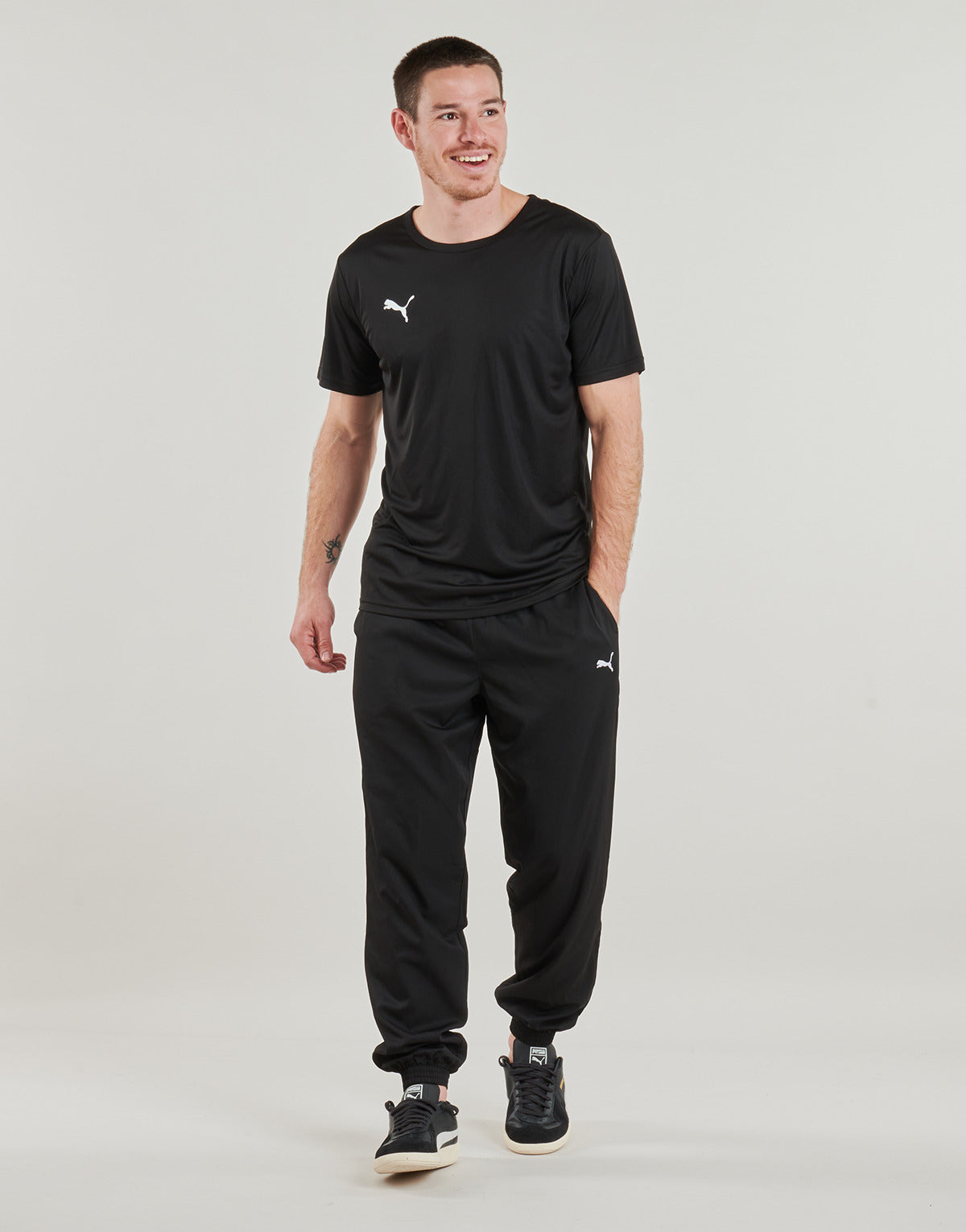 Pantaloni Sportivi Uomo Puma ESS WOVEN PANTS Nero