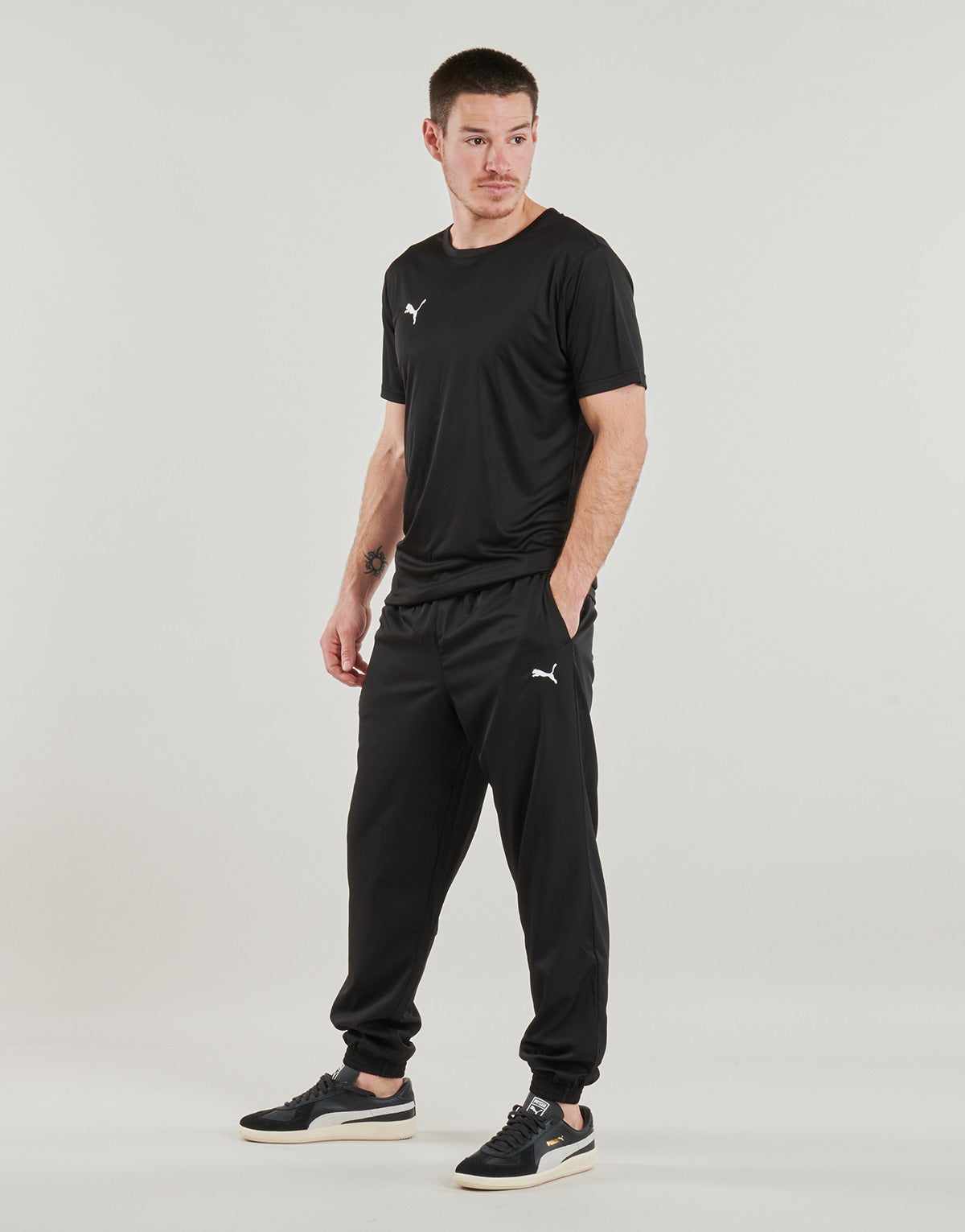 Pantaloni Sportivi Uomo Puma ESS WOVEN PANTS Nero
