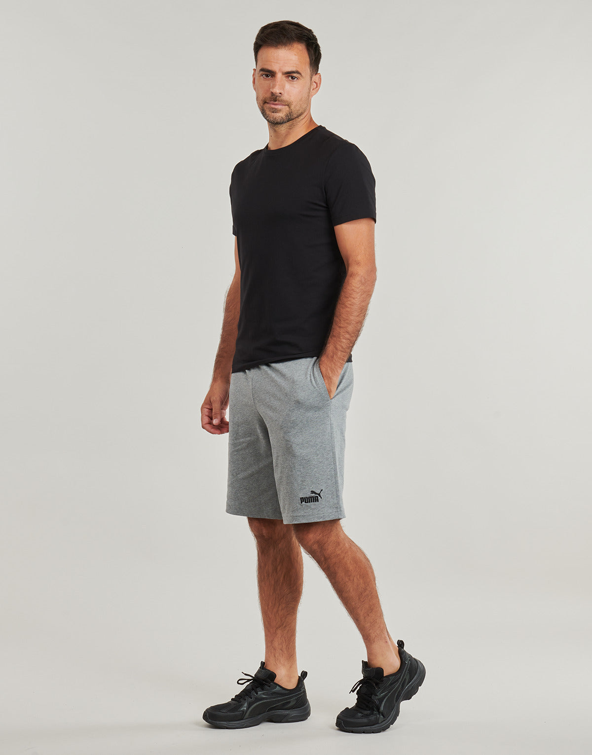 Pantaloni corti Uomo Puma  ESS No. 1 Logo Jersey Shorts  Grigio