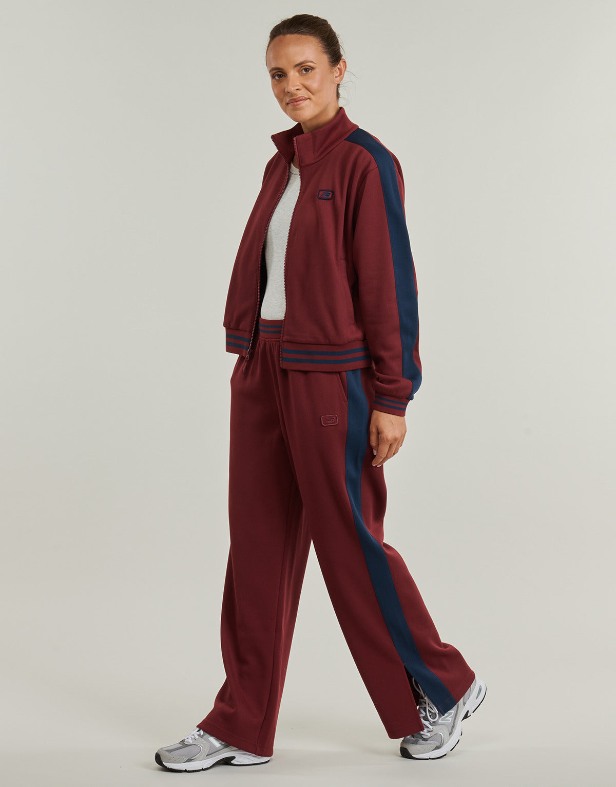 Pantaloni Sportivi Donna New Balance  POST SEASON PIQUE TRACK JACKET  Rosso