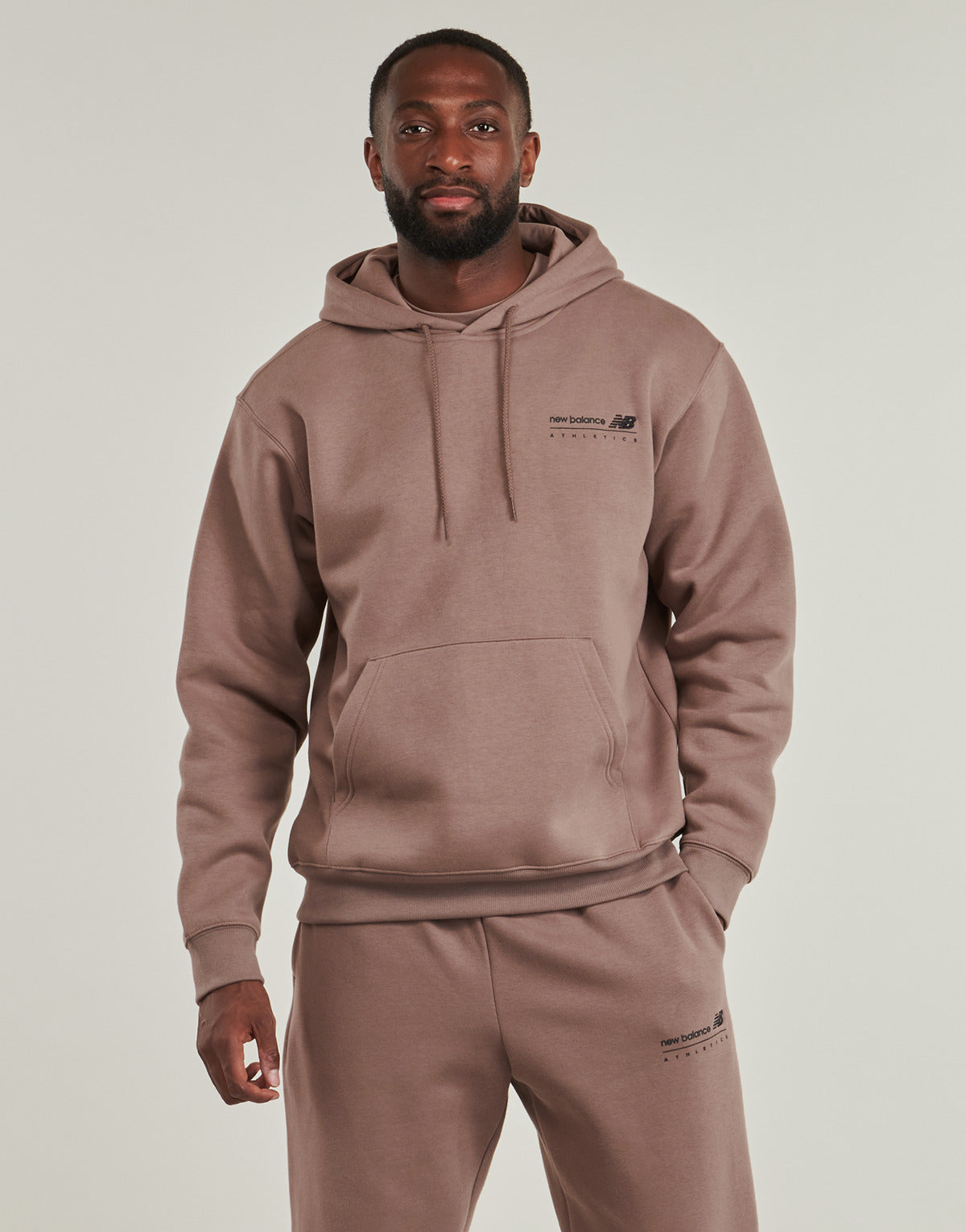 Felpa Uomo New Balance  LINEAR GRAPHIC FLEECE HOODIE  Marrone