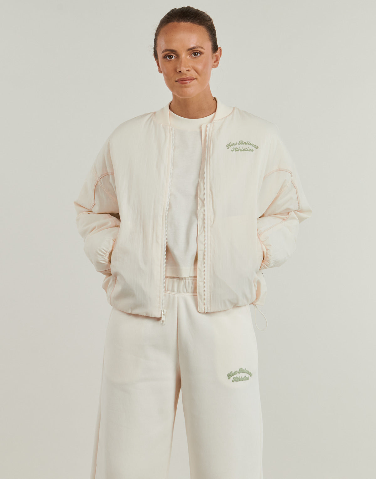 Giubbotto Donna New Balance  LINEAR HERITAGE WOVEN BOMBER JACKET  Beige