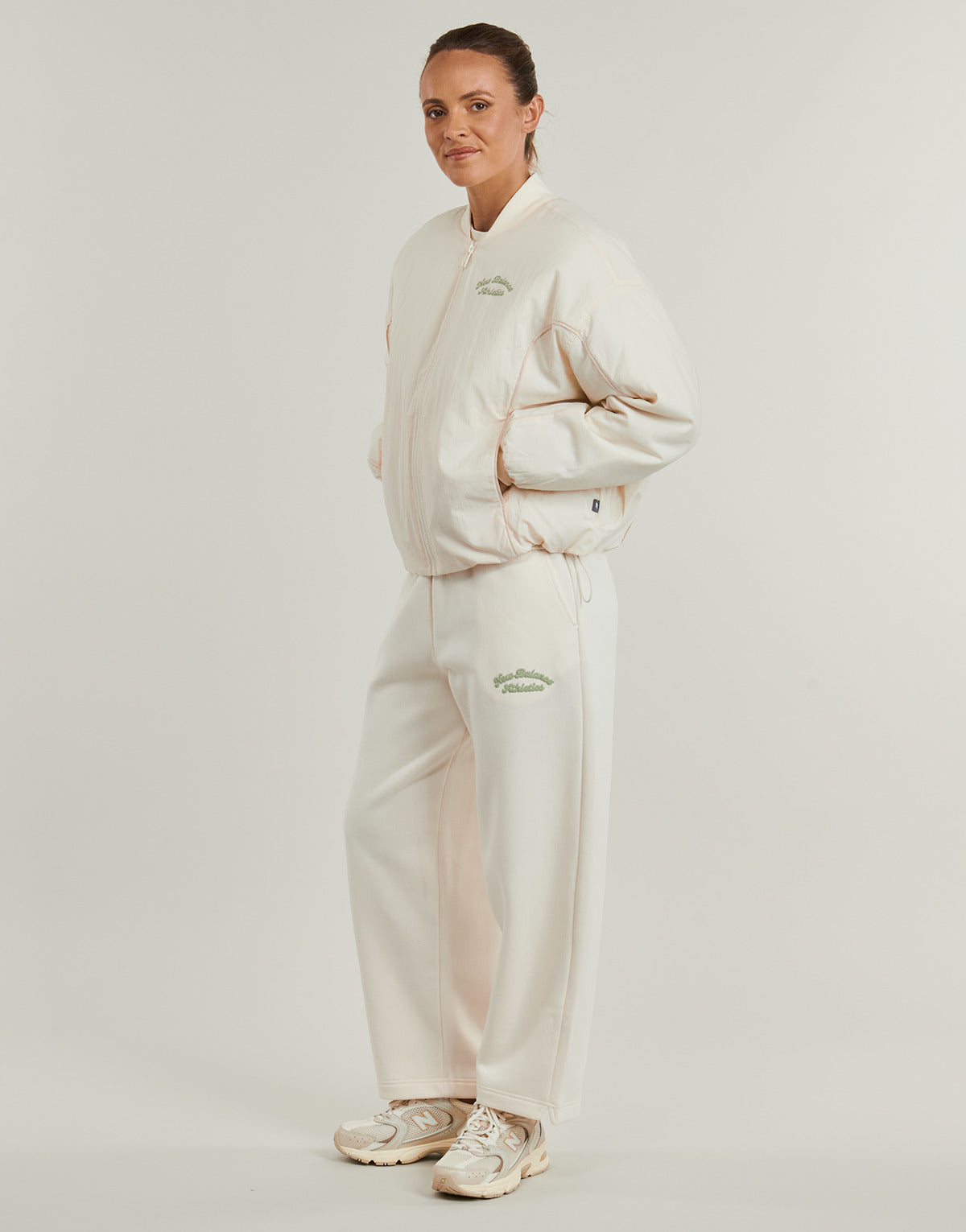 Giubbotto Donna New Balance  LINEAR HERITAGE WOVEN BOMBER JACKET  Beige