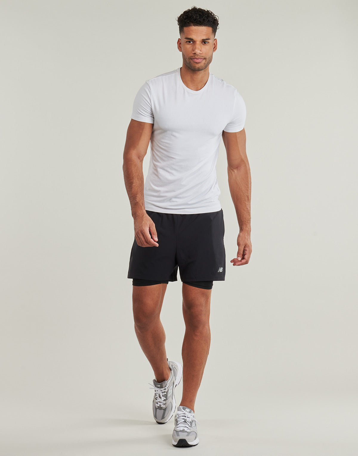 Pantaloni corti Uomo New Balance  SPORT ESSENTIAL LINED SHORT  Nero