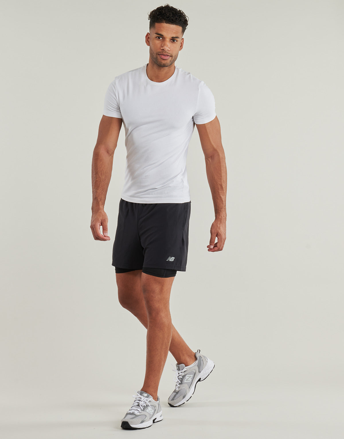 Pantaloni corti Uomo New Balance  SPORT ESSENTIAL LINED SHORT  Nero