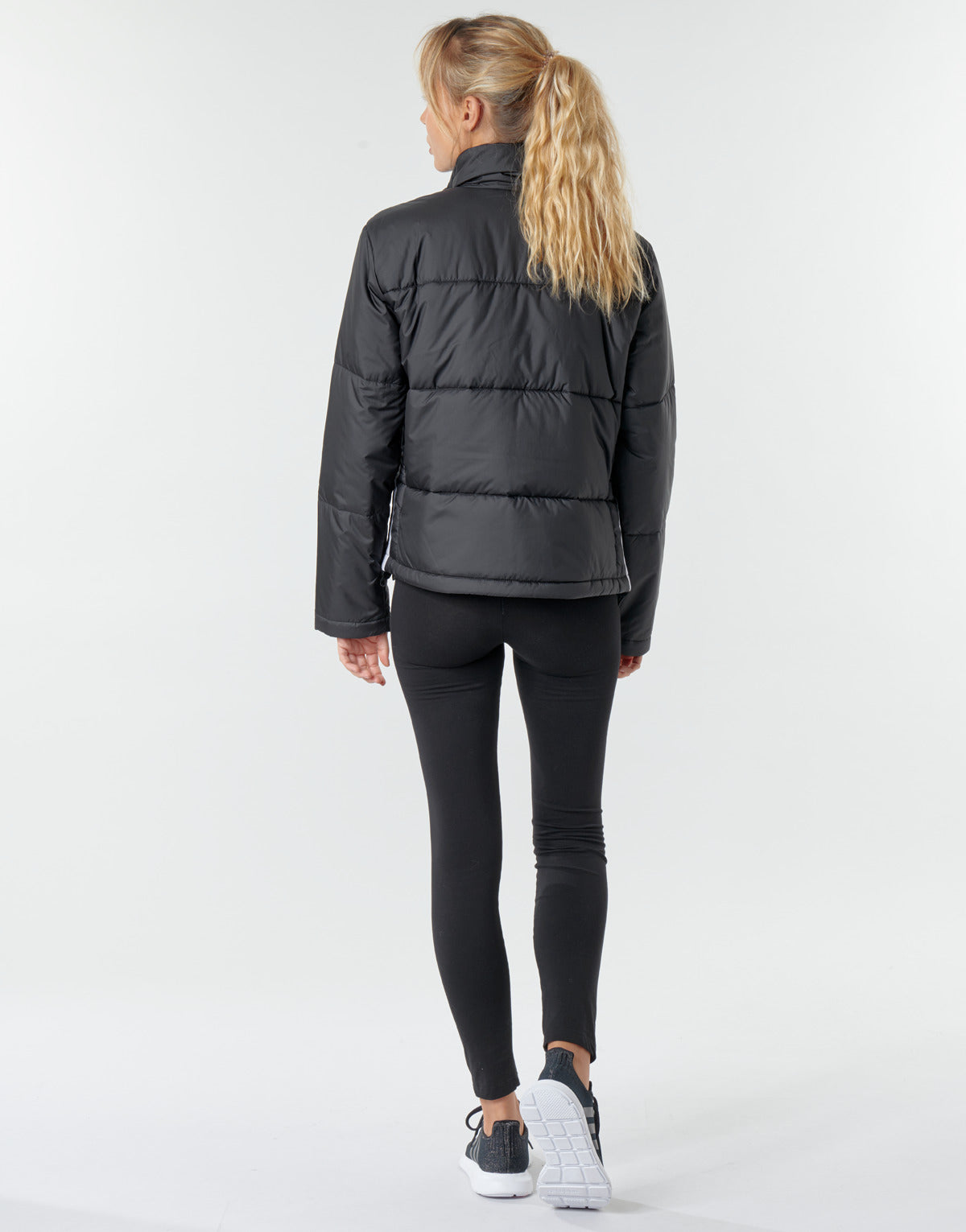 Piumino Donna adidas  SHORT PUFFER  Nero