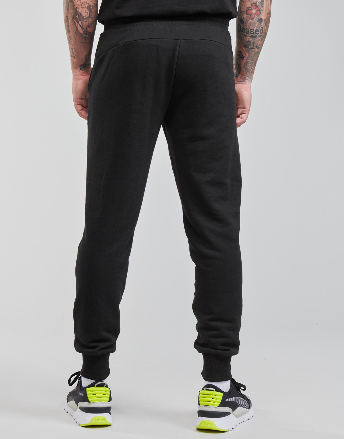 Pantaloni Sportivi Uomo Puma  ESS LOGO PANTS FL CL  Nero