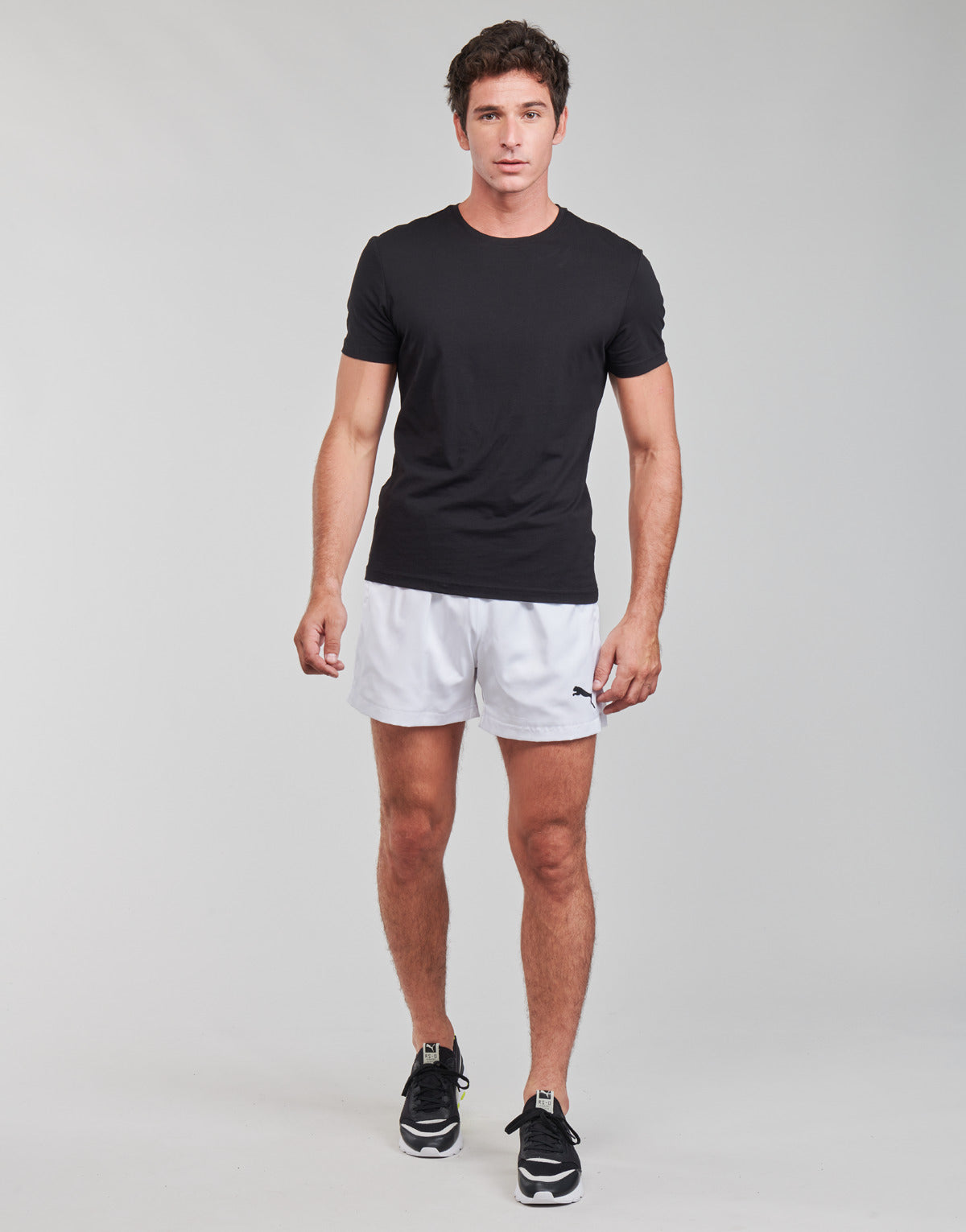 Pantaloni corti Uomo Puma  ESS ACTIVE WOVEN SHORT  Bianco