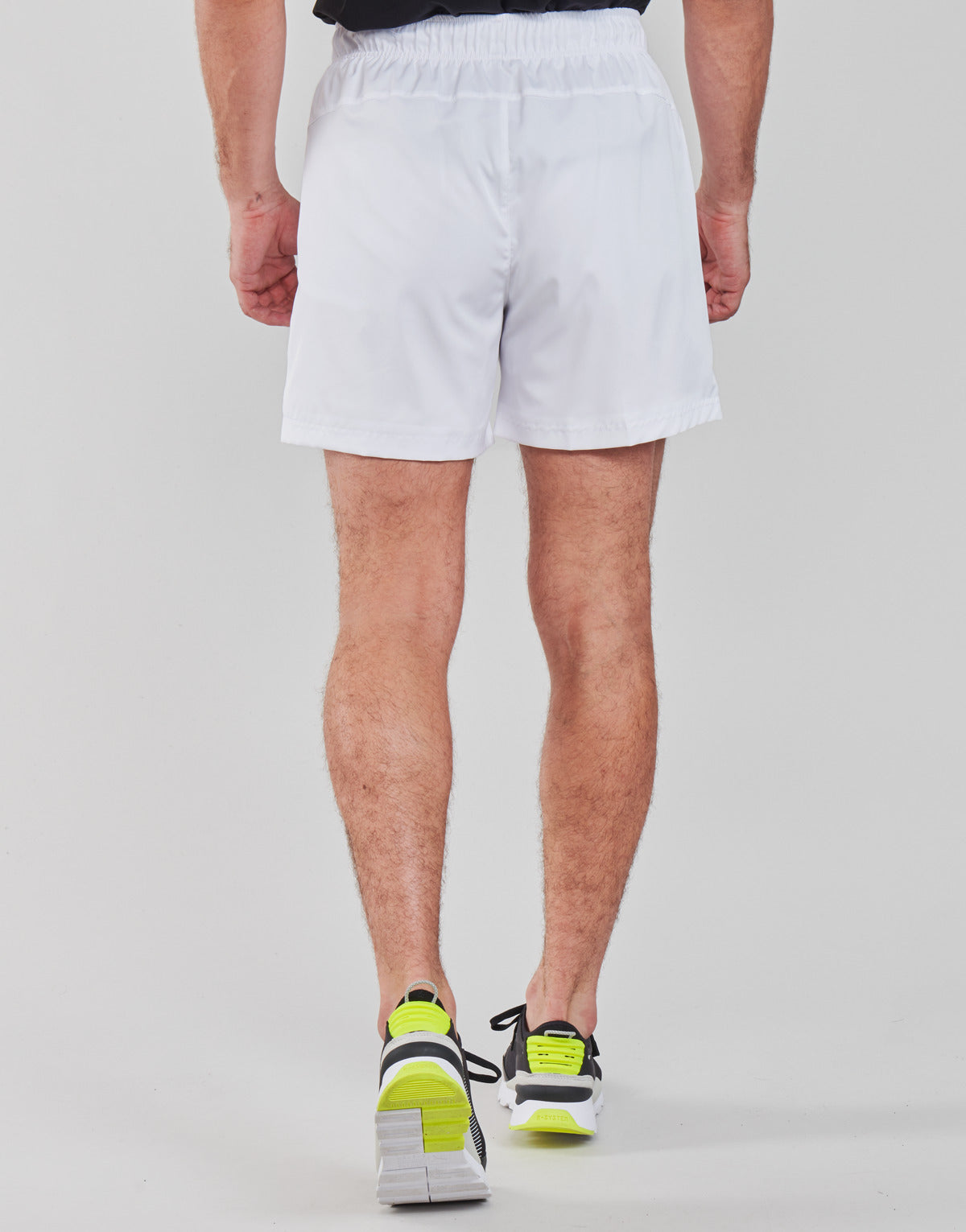 Pantaloni corti Uomo Puma  ESS ACTIVE WOVEN SHORT  Bianco