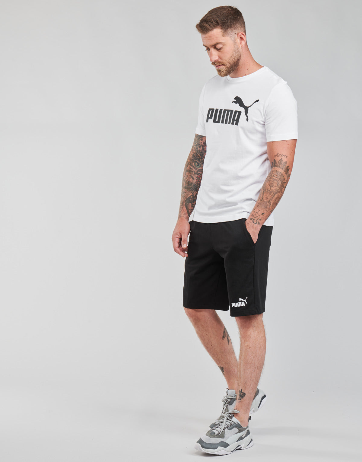 Pantaloni corti Uomo Puma  ESS JERSEY SHORT  Nero