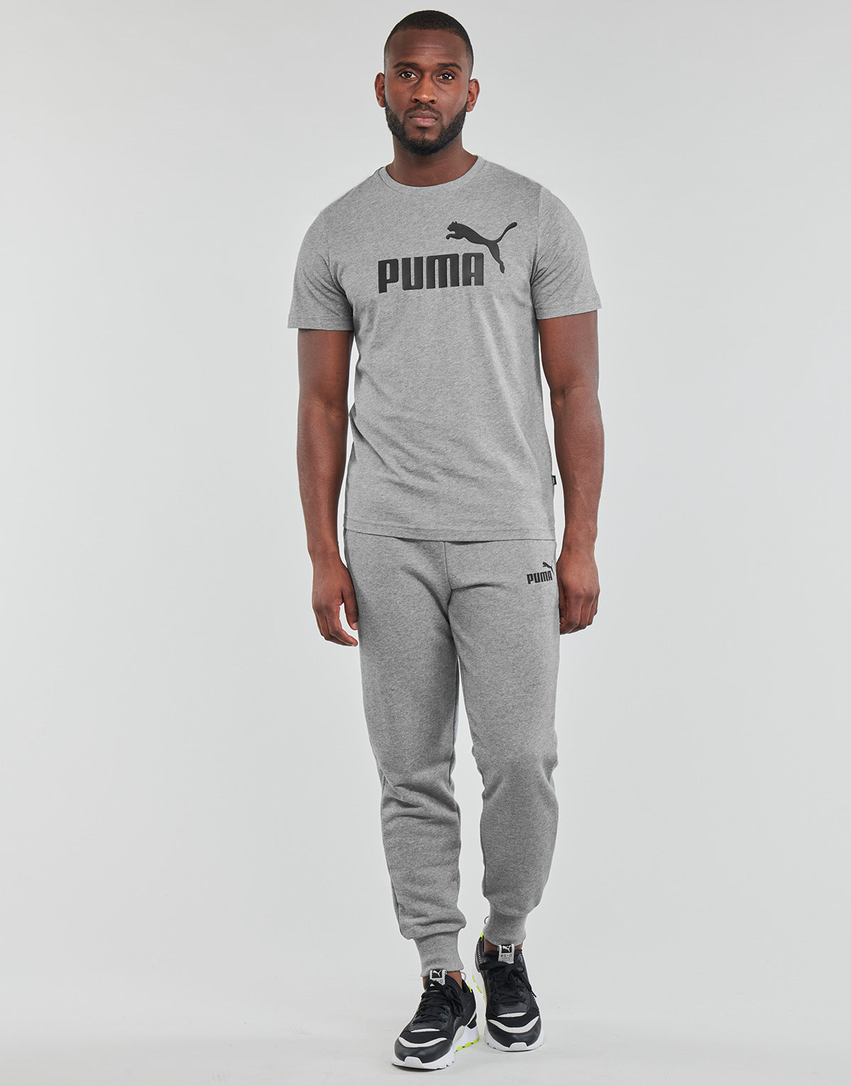 Pantaloni Sportivi Uomo Puma  ESS LOGO PANT CAT FL CL  Grigio