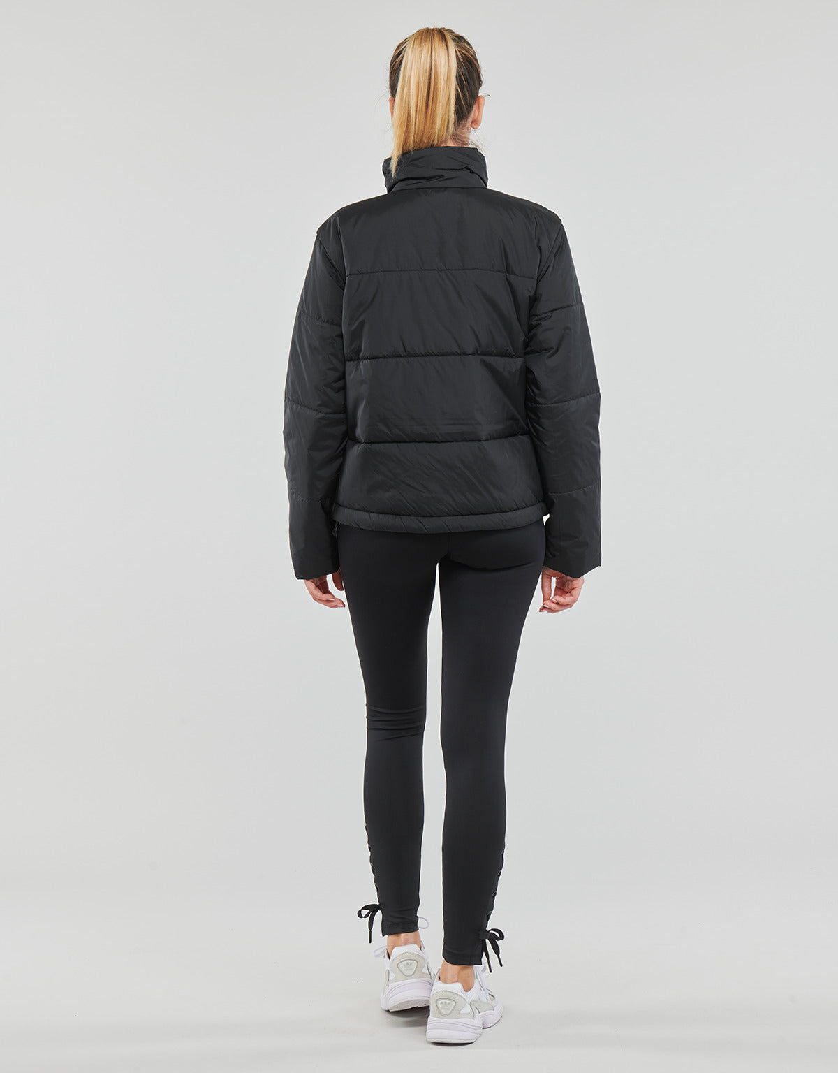 Piumino Donna adidas  SHORT PUFFER  Nero