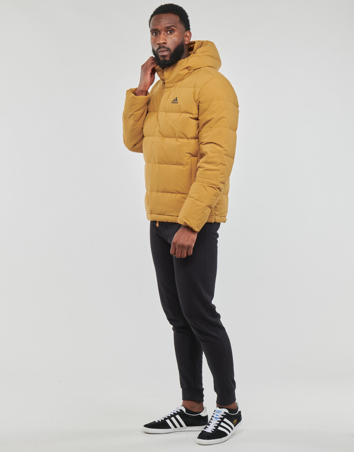 Piumino Uomo adidas  HELIONIC HO JKT  Giallo