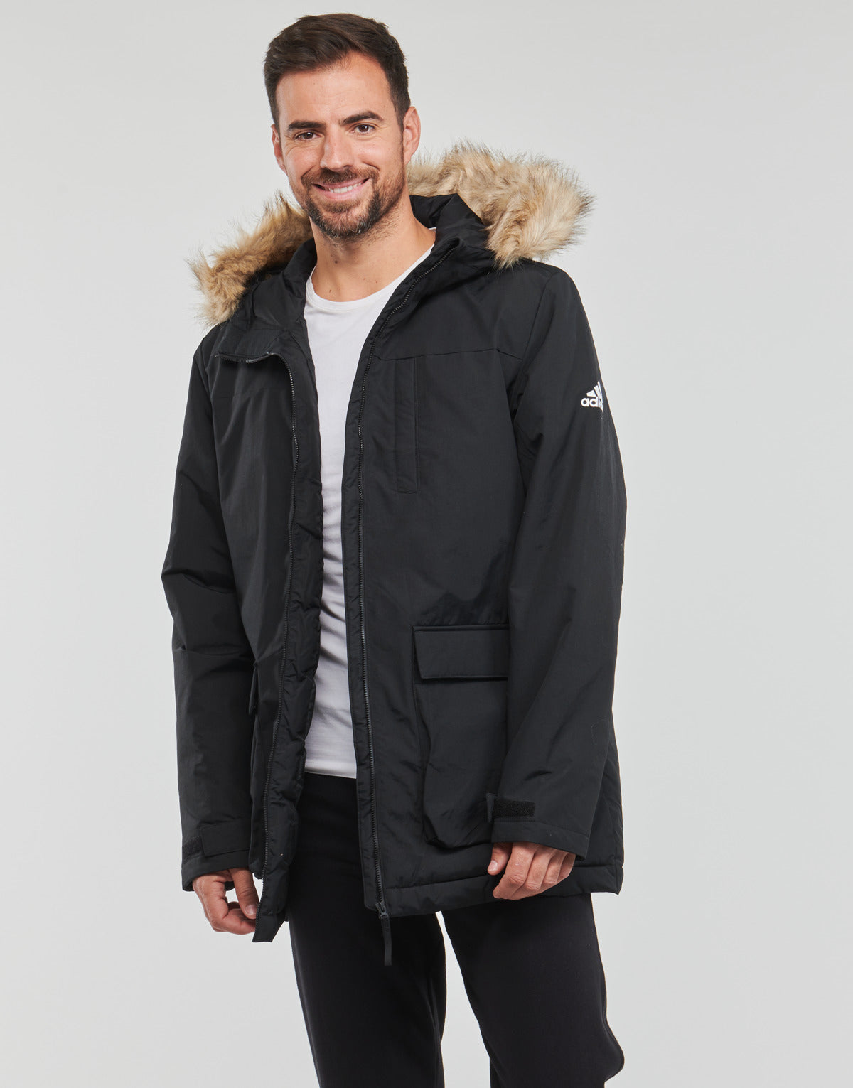 Piumino Uomo adidas  HOODED PARKA  Nero