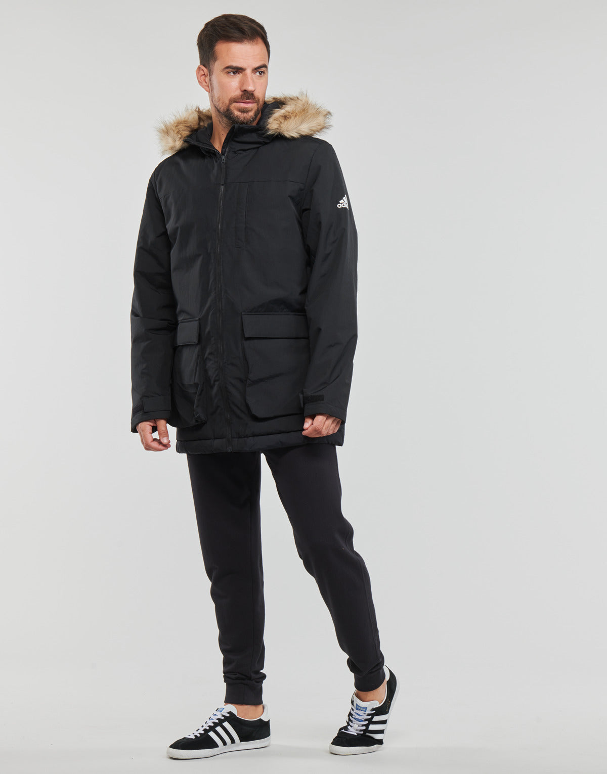 Piumino Uomo adidas  HOODED PARKA  Nero