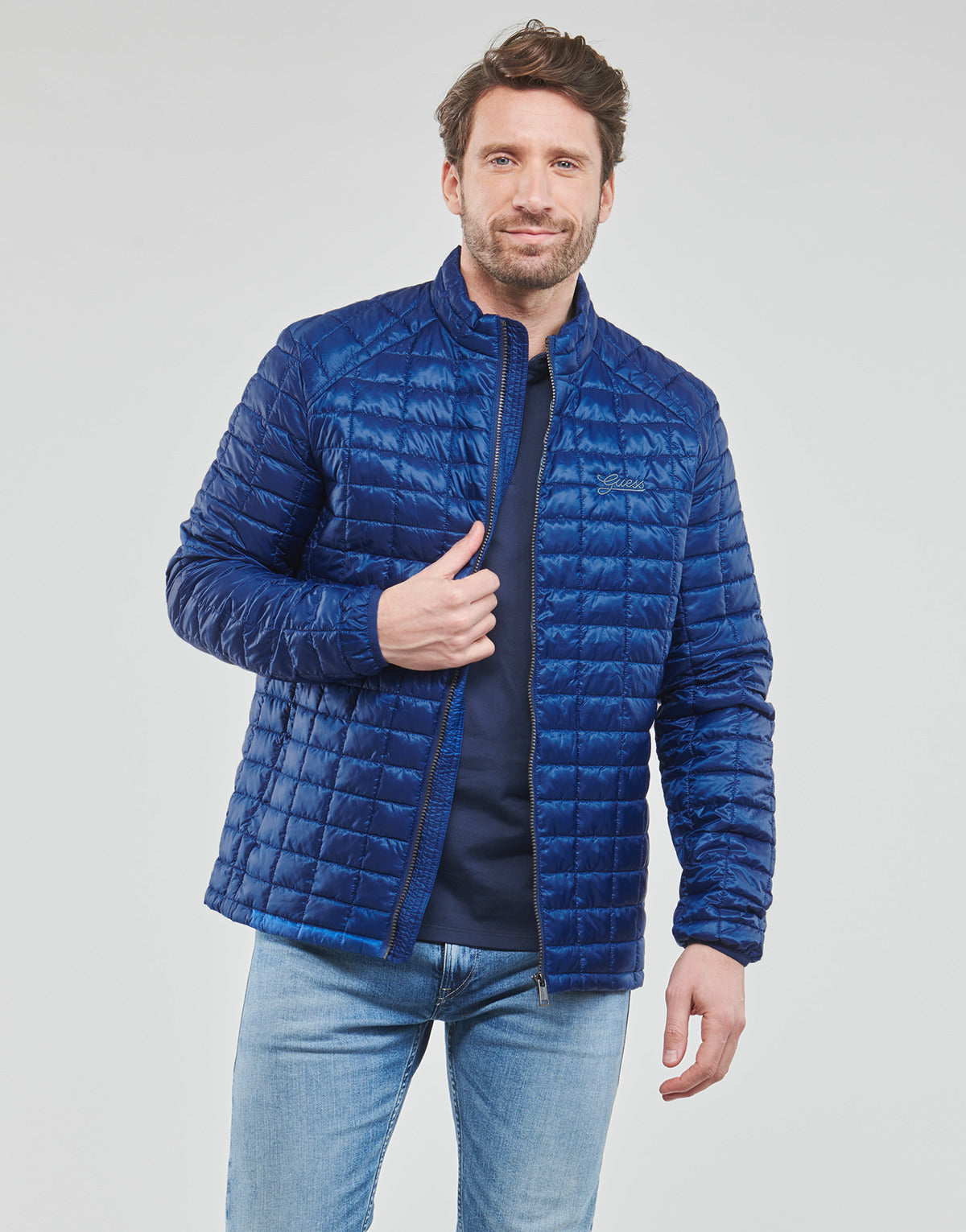 Piumino Uomo Guess  SUPER LIGHT JKT PACKABLE  Blu