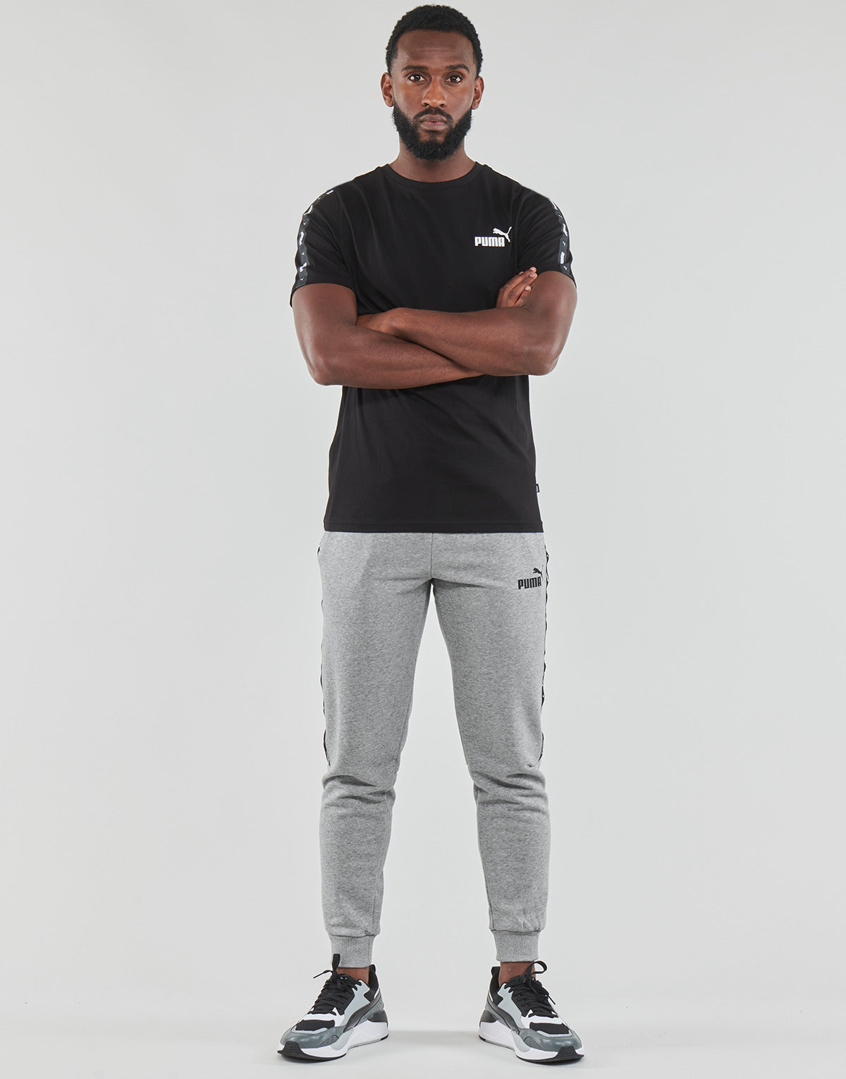 Pantaloni Sportivi Uomo Puma  ESS  TAPE  SWEATPANT  Grigio