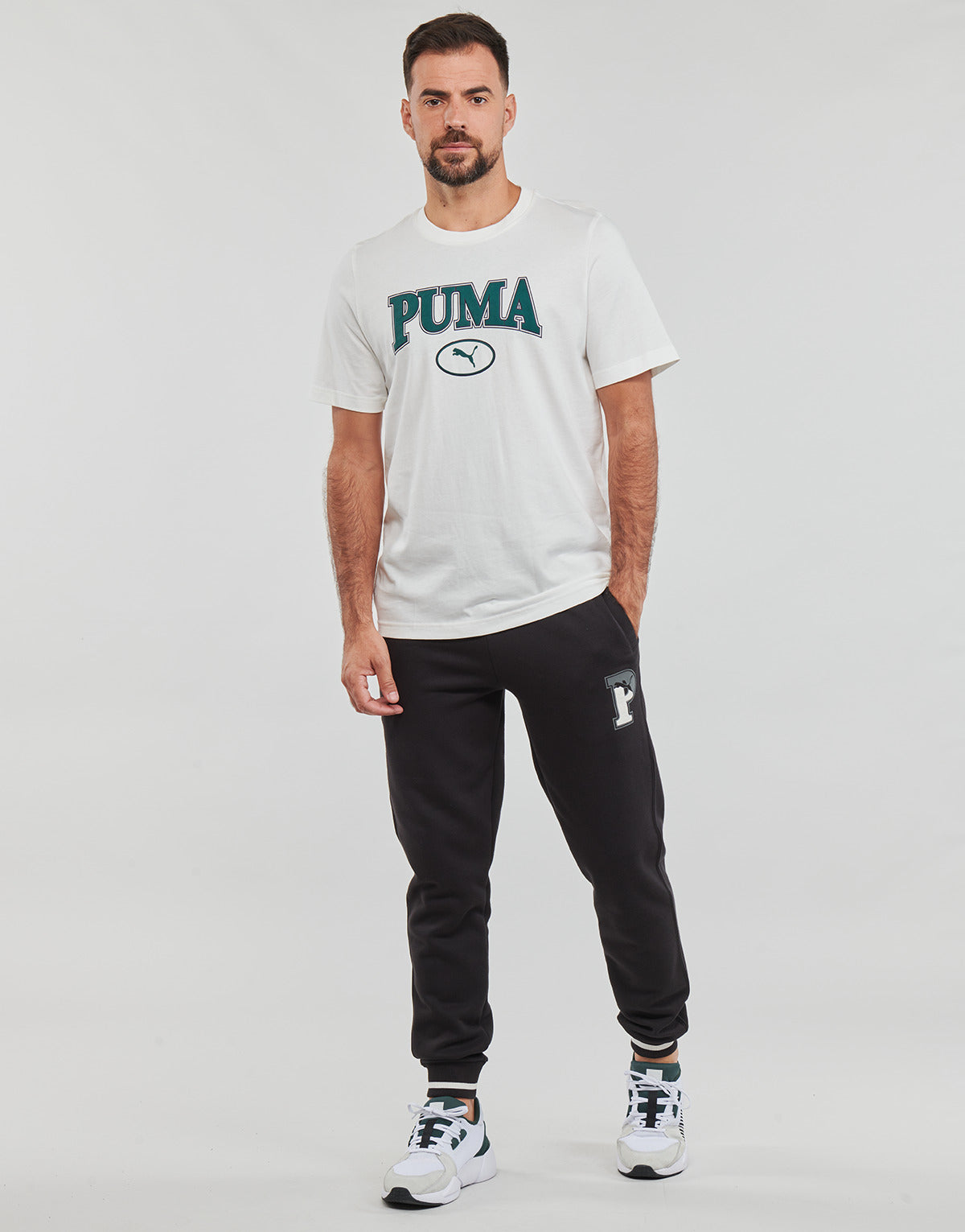 Pantaloni Sportivi Uomo Puma  PUMA SQUAD SWEATPANTS FL CL  Nero